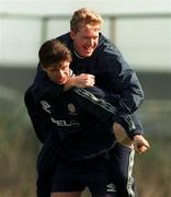 23 March 1999; Niall Quinn carries Steve Staunton during Republic of Ireland Squad Training at the AUL Grounds in Clonshaugh, Dublin. Photo by Ray Lohan/Sportsfile