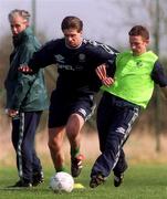 23 March 1999; Niall Quinn is tackled by Mark Kinsella during Republic of Ireland Squad Training at the AUL Grounds in Clonshaugh, Dublin. Photo by Matt Browne/Sportsfile