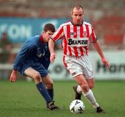28 February 1999; Nicky Reid of Sligo Rovers in action against Eamonn McLoughlin of UCD during the Harp Lager National League Premier Division match between UCD and Sligo Rovers in Belfield Park in Dublin. Photo by David Maher/Sportsfile