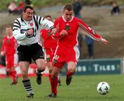 14 March 1999; Ollie Cahill of Cork City is tackled by Tom McNulty of Dundalk during the Harp Lager National League Premier Division match between Cork City and Dundalk in Turners Cross in Cork. Photo by David Maher/Sportsfile