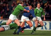 4 January 1997; Paolo Vaccari of Italy is tackled by Eric Miller and David Corkery of Ireland during the International Rugby match between Ireland and Italy at Lansdowne Road in Dublin. Photo by Brendan Moran/Sportsfile