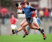 28 March 1999; Paul Croft of Dublin in action against Ciaran O'Sullivan of Cork during the Church and General National Football League Division 1 match between Cork and Dublin at Páirc Uí Rinn in Cork. Photo by Brendan Moran/Sportsfile