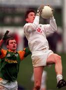 28 March 1999; Paul McCormack of Kildare in action against Paddy Reynolds of Meath during the Church and General National Football League Division 1 match between Meath and Kildare at Páirc Tailteann in Navan, Meath. Photo by Ray McManus/Sportsfile