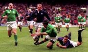 20 March 1999; David Humphreys of Ireland is tackled by Scott Murray of Scotland during the Five Nations Rugby Championship match between Scotland and Ireland in Murrayfield Stadium in Edinburgh, Scotland. Photo by Matt Browne/Sportsfile