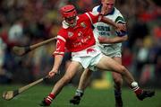 27 March 1999; Sean McGrath of Cork in action against Brian Flannery of Waterford during the Church and General National Hurling League Division 1B match between Cork and Waterford at Páirc Uí Rinn in Cork. Photo by Brendan Moran/Sportsfile