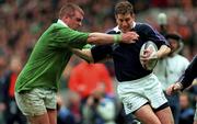 20 March 1999; Shaun Longstaff of Scotland is tackled by Victor Costello of Ireland during the Five Nations Rugby Championship match between Scotland and Ireland in Murrayfield Stadium in Edinburgh, Scotland. Photo by Brendan Moran/Sportsfile