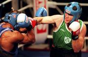 26 March 1999; Stephen Reynolds of Ireland, right, trades punches with Stanley McCann of USA during the International Boxing card between Ireland and USA at the National Stadium in Dublin. Photo by Ray Lohan/Sportsfile