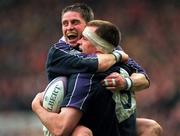 20 March 1999; Stuart Grimes of Scotland celebrates with team-mate Alan Tate, left, after scoring a try during the Five Nations Rugby Championship match between Scotland and Ireland in Murrayfield Stadium in Edinburgh, Scotland. Photo by Brendan Moran/Sportsfile