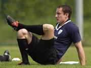 14 June 2005; Centre Kieran Lewis does some stretching exercises during training. Ireland rugby squad training, Tatsumi No Mori Rugby training facility, Tokyo, Japan. Picture credit; Brendan Moran / SPORTSFILE