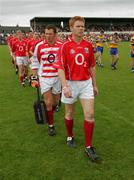 12 June 2005; Cork captain Sean Levis leads his team in the pre-match parade. Bank of Ireland Munster Senior Football Championship Semi-Final, Clare v Cork, Cusack Park, Ennis, Co. Clare. Picture credit; Kieran Clancy / SPORTSFILE