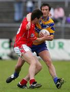 12 June 2005; David Russell, Clare, in action against  Derek Kavanagh, Cork. Bank of Ireland Munster Senior Football Championship Semi-Final, Clare v Cork, Cusack Park, Ennis, Co. Clare. Picture credit; Kieran Clancy / SPORTSFILE