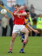 12 June 2005; Niall Geary, Cork, in action against Rory Donnelly, Clare. Bank of Ireland Munster Senior Football Championship Semi-Final, Clare v Cork, Cusack Park, Ennis, Co. Clare. Picture credit; Kieran Clancy / SPORTSFILE