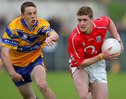 12 June 2005; Fintan Gould, Cork, in action against Kevin Dilleen, Clare. Bank of Ireland Munster Senior Football Championship Semi-Final, Clare v Cork, Cusack Park, Ennis, Co. Clare. Picture credit; Kieran Clancy / SPORTSFILE