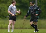 15 June 2005; Winger Anthony Horgan, left, in conversation with assistant coach Michael Bradley after training. Ireland rugby squad training, Tatsumi No Mori Rugby training facility, Tokyo, Japan. Picture credit; Brendan Moran / SPORTSFILE