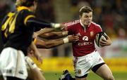 15 June 2005; Brian O'Driscoll, British and Irish Lions, breaks through the Wellington defence. British and Irish Lions Tour to New Zealand 2005, Wellington v British and Irish Lions, Westpac Stadium, Wellington, New Zealand. Picture credit; Richard Lane / SPORTSFILE