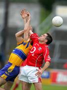 12 June 2005; Martin Cronin, Cork, in action against Odran O'Dwyer, Clare. Bank of Ireland Munster Senior Football Championship Semi-Final, Clare v Cork, Cusack Park, Ennis, Co. Clare. Picture credit; Kieran Clancy / SPORTSFILE