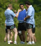 17 June 2005; Assistant coaches Mark McCall, left, and Michael Bradley discuss the training whistles with head coach Niall O'Donovan, right, before training. Ireland rugby squad training, Tatsumi No Mori Rugby training facility, Tokyo, Japan. Picture credit; Brendan Moran / SPORTSFILE