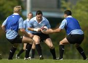 17 June 2005; Flanker David Wallace in action against Roger Wilson, let, and Jeremy Staunton during training. Ireland rugby squad training, Tatsumi No Mori Rugby training facility, Tokyo, Japan. Picture credit; Brendan Moran / SPORTSFILE