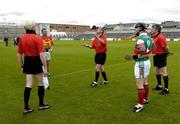 12 June 2005; Referee Pat Greene tosses the coin as team captains Johnny Nevin, Carlow, and Derek Walsh, Mayo, look on. Christy Ring Cup, Group 2B, Round 2, Mayo v Carlow, Pearse Stadium, Galway. Picture credit; Ray McManus / SPORTSFILE