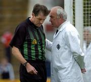 12 June 2005; Referee Michael Monahan consults with an umpire during the match. Bank of Ireland Connacht Senior Football Championship Semi-Final, Galway v Leitrim, Pearse Stadium, Galway. Picture credit; Ray McManus / SPORTSFILE