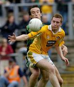 18 June 2005; Kevin McGourty, Antrim, in action against Anthony Moyles, Meath. Bank of Ireland All-Ireland Senior Football Championship Qualifier, Round 1, Antrim v Meath, Casement Park, Belfast. Picture credit; David Maher / SPORTSFILE