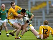 18 June 2005; Tomas O'Connor, Meath, in action against  Mark McCrory, left, and Terry O'Neill, Antrim. Bank of Ireland All-Ireland Senior Football Championship Qualifier, Round 1, Antrim v Meath, Casement Park, Belfast. Picture credit; David Maher / SPORTSFILE