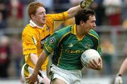 18 June 2005; David Crimmins, Meath, in action against Terry O'Neill, Antrim. Bank of Ireland All-Ireland Senior Football Championship Qualifier, Round 1, Antrim v Meath, Casement Park, Belfast. Picture credit; David Maher / SPORTSFILE