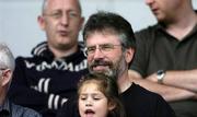 18 June 2005; Sinn Fein president Gerry Adams with his grand-daughter Drithle during the game. Bank of Ireland All-Ireland Senior Football Championship Qualifier, Round 1, Antrim v Meath, Casement Park, Belfast. Picture credit; David Maher / SPORTSFILE