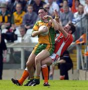 18 June 2005; Brendan Devenney, Donegal, in action against Enda McNulty, Armagh. Bank of Ireland Ulster Senior Football Championship Replay, Armagh v Donegal, St. Tighernach's Park, Clones, Co. Monaghan. Picture credit; Pat Murphy / SPORTSFILE
