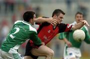 18 June 2005; Liam Doyle, Down, in action against Michael Lilley, Fermanagh. Bank of Ireland All-Ireland Senior Football Championship Qualifier, Round 1, Down v Fermanagh, Pairc an Iuir, Newry, Co. Down. Picture credit; David Maher / SPORTSFILE