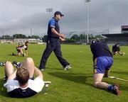 18 June 2005; Clare manager Anthony Daly talks to his players before the match as they do their stretches. Guinness All-Ireland Senior Hurling Championship Qualifier, Round 1, Dublin v Clare, Parnell Park, Dublin. Picture credit; Brian Lawless / SPORTSFILE