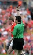 18 June 2005; Referee Maurice Deegan shows the red card to Armagh's Francie Bellew. Bank of Ireland Ulster Senior Football Championship Replay, Armagh v Donegal, St. Tighernach's Park, Clones, Co. Monaghan. Picture credit; Oliver McVeigh / SPORTSFILE