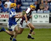 18 June 2005; Ger Farragher, Galway, in action against Cahir Healy, Laois. Guinness All-Ireland Senior Hurling Championship Qualifier, Round 1, Laois v Galway, O'Moore Park, Portlaoise, Co. Laois. Picture credit; Ray McManus / SPORTSFILE
