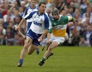 18 June 2005; Ken McGrath, Waterford, in action against Dylan Hayden, Offaly. Guinness All-Ireland Senior Hurling Championship Qualifier, Round 1, Offaly v Waterford, Dr. Cullen Park, Co. Carlow. Picture credit; Damien Eagers / SPORTSFILE
