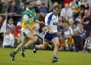 18 June 2005; Eoin McGrath, Waterford, in action against Kevin Brady, Offaly. Guinness All-Ireland Senior Hurling Championship Qualifier, Round 1, Offaly v Waterford, Dr. Cullen Park, Co. Carlow. Picture credit; Damien Eagers / SPORTSFILE