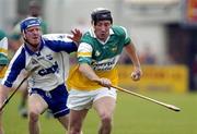 18 June 2005; Brian Whelahan, Offaly, in action against John Mullane, Waterford. Guinness All-Ireland Senior Hurling Championship Qualifier, Round 1, Offaly v Waterford, Dr. Cullen Park, Co. Carlow. Picture credit; Damien Eagers / SPORTSFILE