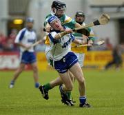 18 June 2005; John Mullane, Waterford, in action against Rory Hanniffy, Offaly. Guinness All-Ireland Senior Hurling Championship Qualifier, Round 1, Offaly v Waterford, Dr. Cullen Park, Co. Carlow. Picture credit; Damien Eagers / SPORTSFILE