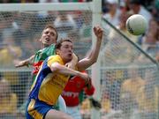 19 June 2005; Stephen Lohan, Roscommon, in action against David Heaney, Mayo. Bank of Ireland Connacht Senior Football Championship Semi-Final, Mayo v Roscommon, Dr. Hyde Park, Roscommon. Picture credit; David Maher / SPORTSFILE