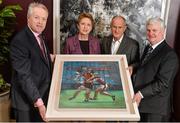 7 February 2014; Former President of Ireland Mary McAleese and husband Martin are presented with a painting by Ulster GAA President Martin McAviney, left, and Aogán O Fearghail, right, Former President, Ulster GAA. The Croke Park Hotel, Jones's Road, Dublin. Picture credit: Ramsey Cardy / SPORTSFILE