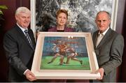 7 February 2014; Former President of Ireland Mary McAleese and husband Martin are presented with a painting by Aogán O Fearghail, Former President, Ulster GAA, right. The Croke Park Hotel, Jones's Road, Dublin. Picture credit: Ramsey Cardy / SPORTSFILE
