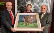 7 February 2014; Former President of Ireland Mary McAleese and husband Martin are presented with a painting by Dr. Danny Murphy, CEO, Ulster GAA, left. The Croke Park Hotel, Jones's Road, Dublin. Picture credit: Ramsey Cardy / SPORTSFILE
