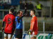 7 February 2014; Referee David Coldrick, issues Robbie Tasker, Armagh, with a red card after a second half incident with Ryan Boyle, Down, left. Allianz Football League, Division 2, Round 2, Armagh v Down, Athletic Grounds, Armagh. Picture credit: Oliver McVeigh / SPORTSFILE