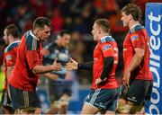 8 February 2014; Andrew Conway, Munster, is congratulated by team-mates James Coughlan, left, and Donncha O'Callaghan, right, after scoring his side's fifth try. Celtic League 2013/14, Round 13, Munster v Cardiff Blues, Thomond Park, Limerick. Picture credit: Diarmuid Greene / SPORTSFILE