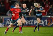 8 February 2014; Andrew Conway, Munster, kicks the ball through on his way to scoring his side's fifth try. Celtic League 2013/14, Round 13, Munster v Cardiff Blues, Thomond Park, Limerick. Picture credit: Diarmuid Greene / SPORTSFILE