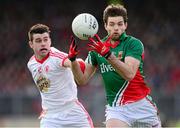 9 February 2014; Ger Cafferkey, Mayo, in action against Darren McCurry, Tyrone. Allianz Football League Division 1 Round 2, Tyrone v Mayo, Healy Park, Omagh, Co. Tyrone. Picture credit: Oliver McVeigh / SPORTSFILE