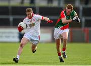 9 February 2014; Peter Hughes, Tyrone, in action against Adam Gallagher, Mayo. Allianz Football League, Division 1, Round 2, Tyrone v Mayo, Healy Park, Omagh, Co. Tyrone. Picture credit: Oliver McVeigh / SPORTSFILE