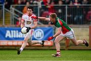 9 February 2014; Mattie Donnelly, Tyrone, in action against Kevin Keane, Mayo. Allianz Football League, Division 1, Round 2, Tyrone v Mayo, Healy Park, Omagh, Co. Tyrone. Picture credit: Oliver McVeigh / SPORTSFILE