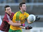 9 February 2014; Odhran MacNiallais, Donegal, in action against Sean Denvir, Galway. Allianz Football League, Division 2, Round 2, Galway v Donegal, Pearse Stadium, Salthill, Galway. Picture credit: Ray Ryan / SPORTSFILE
