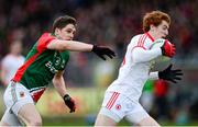 9 February 2014; Peter Harte, Tyrone, in action against Lee Keegan, Mayo. Allianz Football League Division 1 Round 2, Tyrone v Mayo, Healy Park, Omagh, Co. Tyrone. Picture credit: Oliver McVeigh / SPORTSFILE