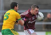 9 February 2014; Michael Martin, Galway, in action against Frank McGlynn, Donegal. Allianz Football League, Division 2, Round 2, Galway v Donegal, Pearse Stadium, Salthill, Galway. Picture credit: Ray Ryan / SPORTSFILE